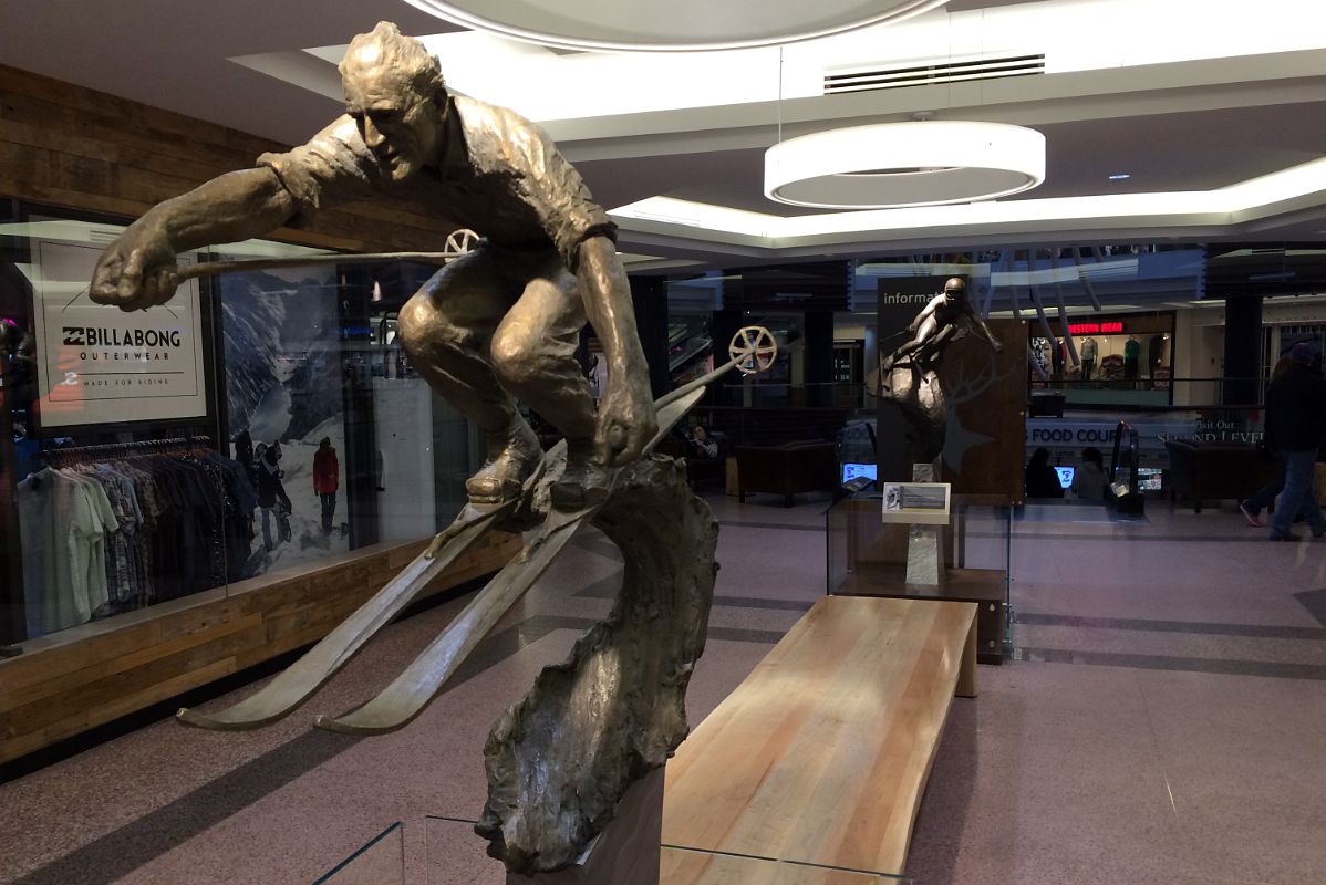 13B Statues Show The Evolution Of Skiing Equipment At The Entrance To Cascade Plaza In Banff